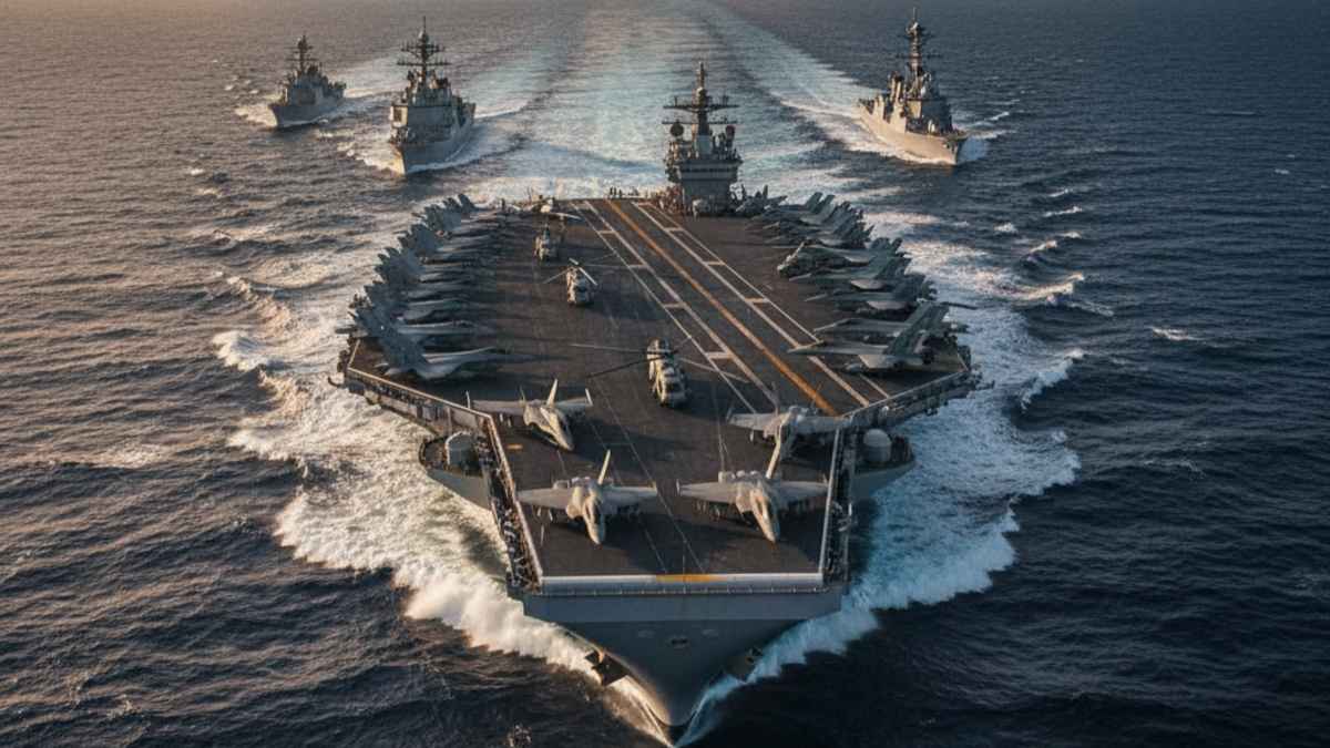 Aircraft carrier with navy ships behind it